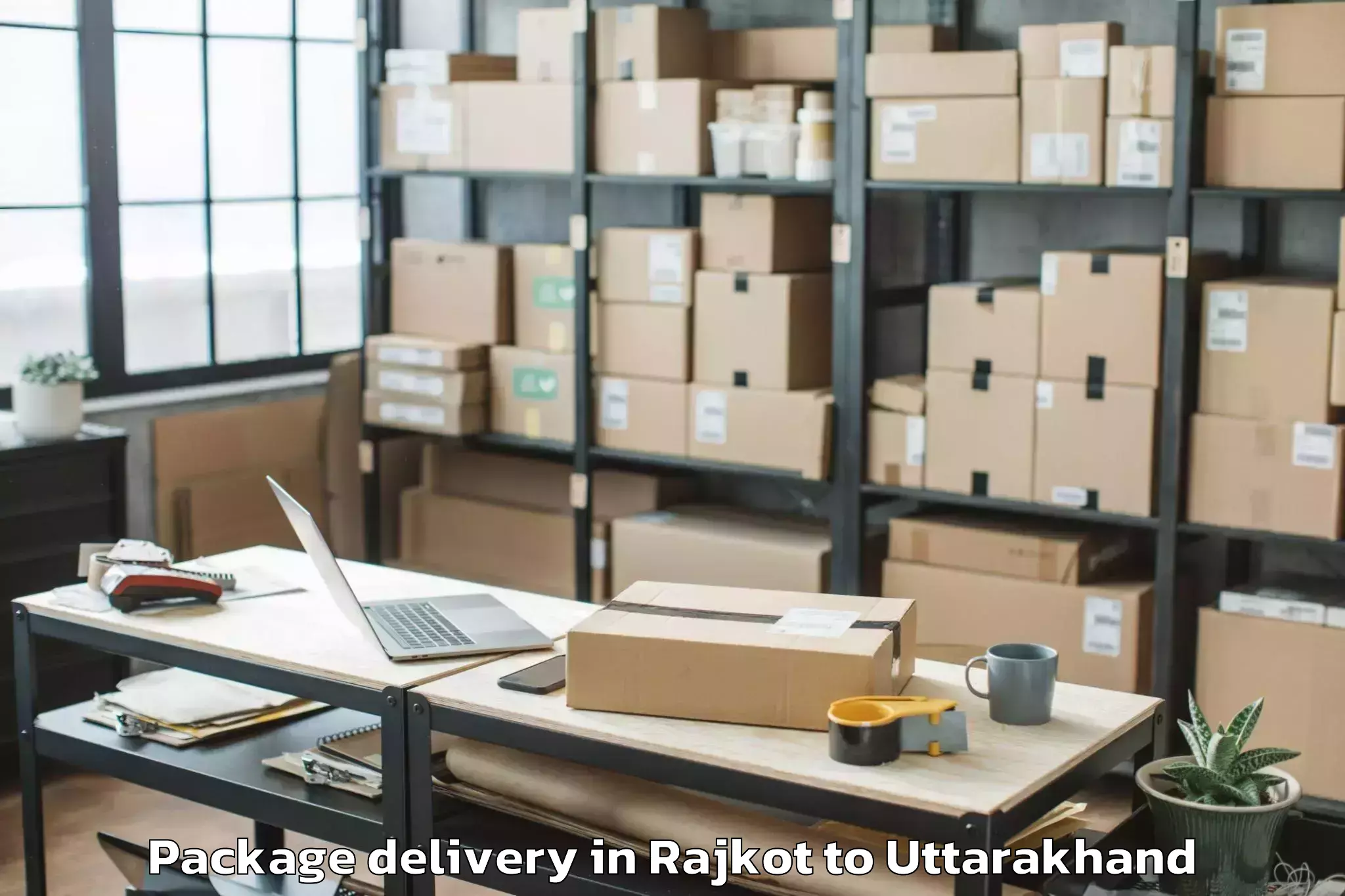 Top Rajkot to Shri Guru Ram Rai University D Package Delivery Available